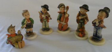 6 Hummel figurines 'Boy with concertina' 'Boy with cello' 'Boy with Trumpet' 'Boy with violin' '