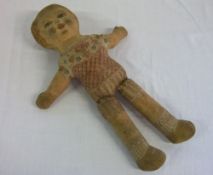 Early 20th cent British doll Length 38 cm.