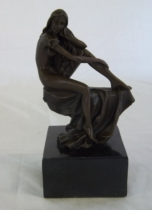After Milo a small bronze figure of a lady h 17cm