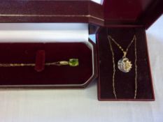 9ct gold Peridot and diamond necklace & sun and moon necklace