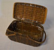 Japanese cane work 2 handled basket with label stating 'Grandma's School Lunch Basket, bought at