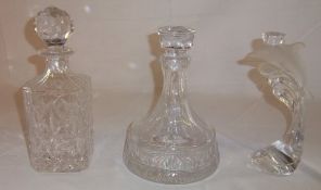 Ships decanter and one other & a dolphin candlestick