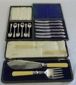 Cased sets of 6 spoons, 6 knives & set of fish servers with sterling silver cuffs