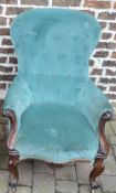 Ornately carved rosewood Vict button back armchair