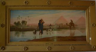 Oil on canvas of an Egyptian desert scene of woman with child & goat in foreground & a pyramid