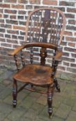 High back dark elm seated Windsor chair with double stretchers