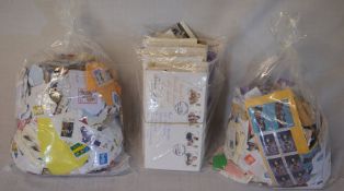 2 bags of loose stamps, FDC & some packs