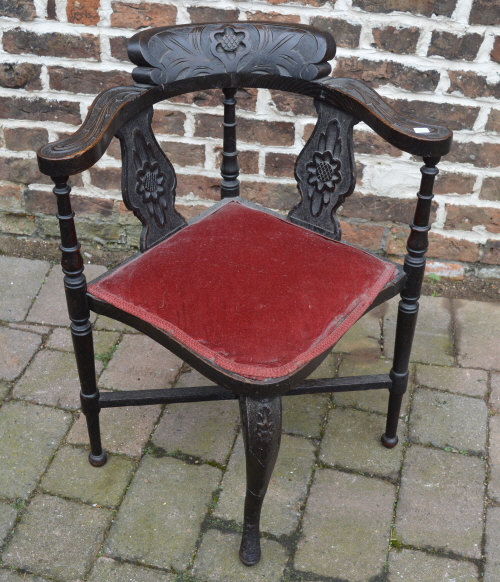 Corner chair with red velvet seat