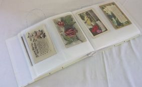 Postcard album containing vintage birthday cards