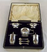 Boxed silver cruet set consisting of 2 salts, 2 peppers, mustard pot & 3 spoons by Walter & Hall