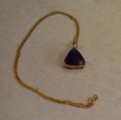 9ct gold amethyst pendant with a diamond set bale