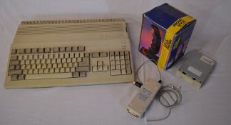 Commodore Amiga 500 personal computer inc Cheetah joystick, video adapter & spare floppy disc drive