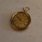 Gold pocket watch marked '18K' with engine turned reverse, total weight 38g