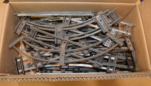 Box of old model train track