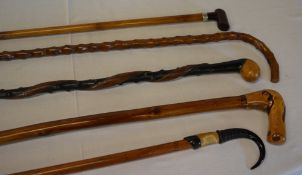 5 walking sticks of various design