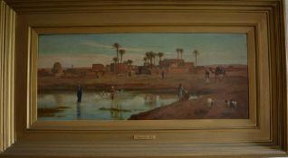 Oil on canvas of an Egyptian desert village scene with river in foreground by Frederick Goodall R