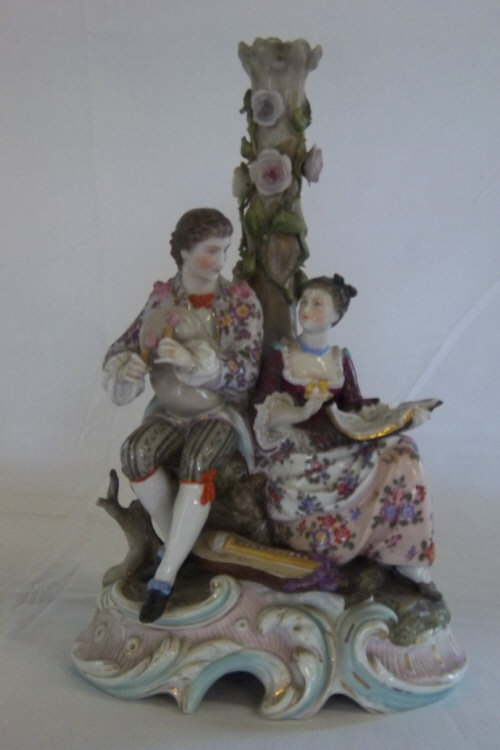 Early 20th cent Meissen style figural candlestick on a scrolled base H 29 cm