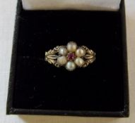 tested as 18ct gold ruby and 1/2 pearl cluster ring
