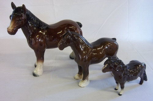 Royal Doulton shire horse plus one other and a Royal Doulton shetland pony