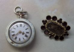 Amethyst mourning brooch & an enamelled ladies swiss movement fob watch