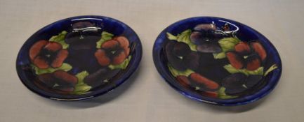 Pr of Moorcroft pansy pattern side plates 18.5 cm