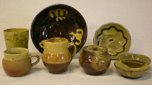 7 items of Winchcombe slipware pottery