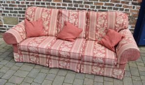 Three seater sofa with arm covers and scatter cushions