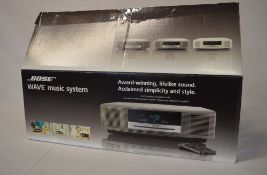 Bose wave music system with original box .