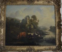 19th cent oil on canvas in an ornate gilt frame of a pastoral scene of cattle with a castle in