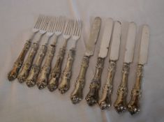 6 silver handled forks & 5 silver handled knives