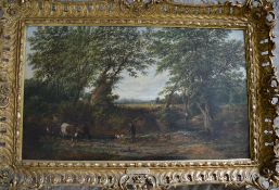 Oil on board in a gilt frame of a landscape with cattle, a man & dog in foreground standing in a