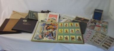 Various cigarette card albums, old stamps, box camera, pin up cigarette cards, miniature weights
