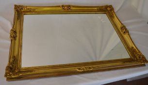 Gilt framed wall mirror