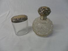 Silver topped glass scent bottle & silver topped dressing table pot