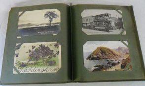 Postcard album containing approx 135 postcards inc topographical, some real photos, comic,