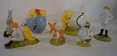 7 Royal Doulton Winnie the Pooh figures inc clock & money box
