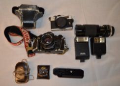 Various cameras inc Canon A1, Ricoh, Tamron lens etc