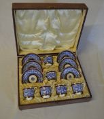 Royal Worcester miniature coffee cups & saucers in a presentation case