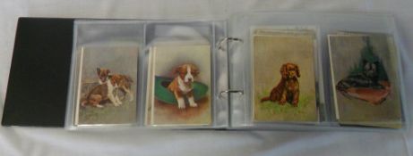 Album of approx 190 postcards inc dogs, flowers, fire engines, cars, aircraft etc