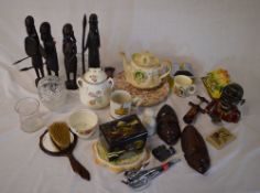 Various ceramics inc teapot, cups, tribal figures & face masks, money box etc