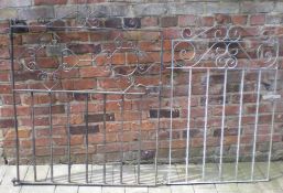 2 wrought iron garden gates