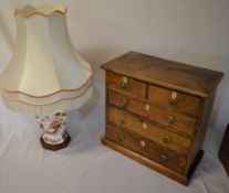 Miniature chest of drawers & a table lamp