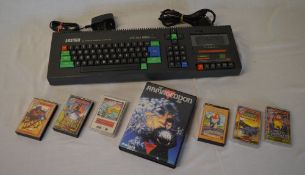 Amstrad CPC464 64k personal computer includes power adapter, av scart lead & 7 cassette games