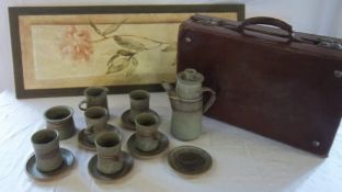 Stoneware part coffee set, old leather suitcase, floral print by Cheri Blum