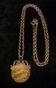1912 mounted full Sovereign on a tested as 9ct gold chain total weight 15.6 g