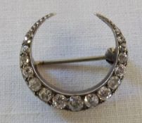 Diamond crescent brooch approx 0.80 ct diamonds