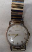 9ct gold Helvetia wrist watch with rolled gold strap