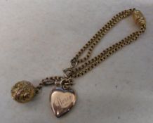 9ct gold bracelet with heart shaped locket 10.8 g