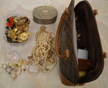 Lge quant of costume jewellery in a handbag