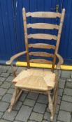 Rush seated ladder back rocking chair